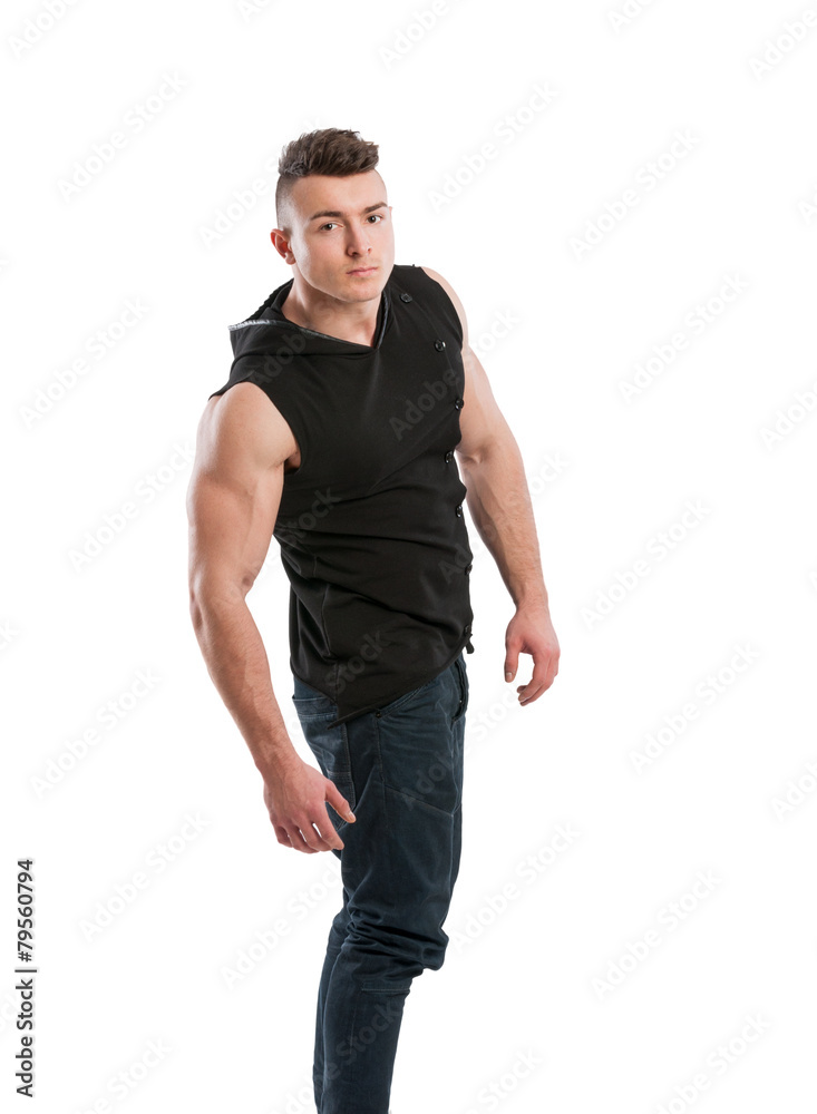 Fototapeta premium Young man wearing jeans and black hoodie