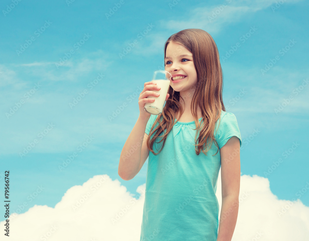 smiling little girl drinking milk out of glass smiling little girl drinking milk out of glass
