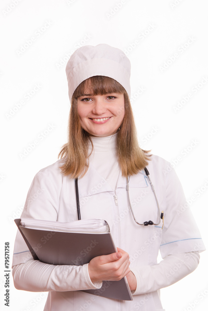 Health worker in uniform with documents in hand Health worker in uniform with documents in hand