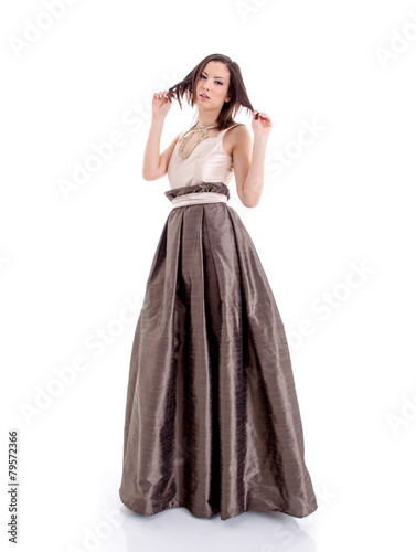 Beautiful woman in a brown dress