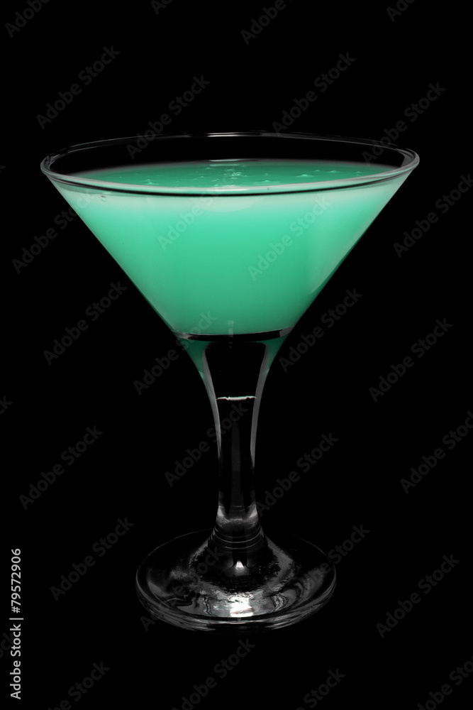 Cocktail in glass on black background isolated. Cocktail in glass on black background isolated.