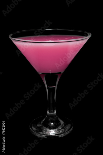 Cocktail in glass on black background isolated.