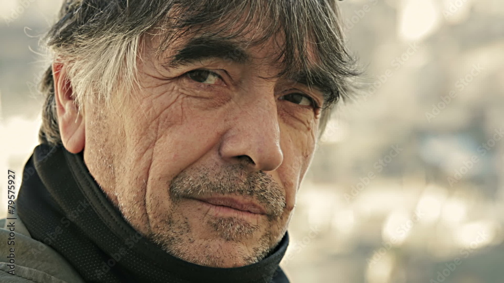 Close up of a mature man portrait lost in thought Close up of a mature man portrait lost in thought