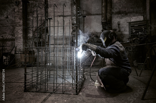Welder with protective mask welding reinforcement bars