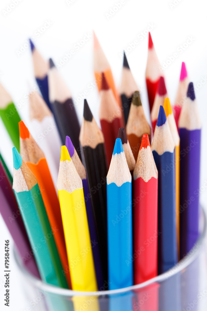 Colorful pencils in glass isolated on white