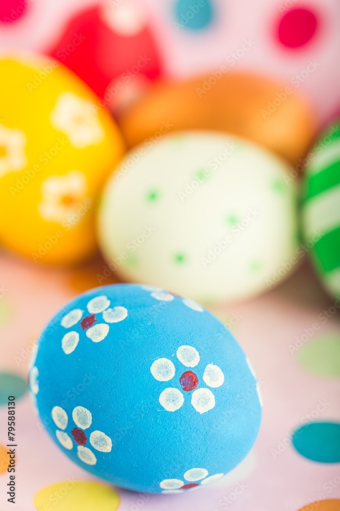 Easter decorations - eggs with painted flowers on the tabletop