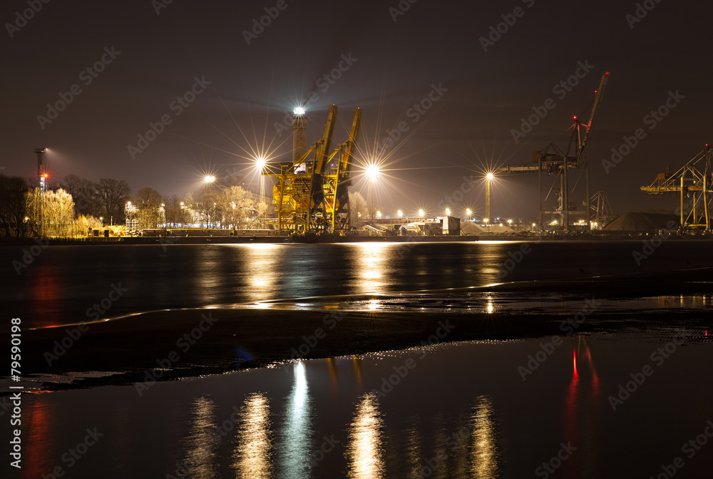 Night view of a port with lights reflection in water, Swinoujscie, Poland.