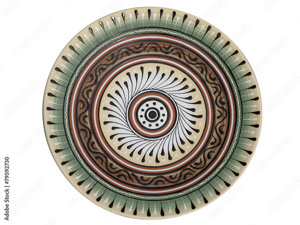 handmade ornated pottery plate isolated on white handmade ornated pottery plate isolated on white