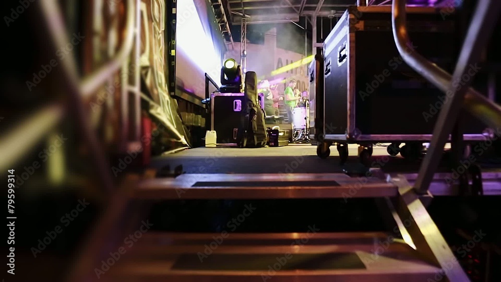 Subjective shot of someone entering music stage through Stairway