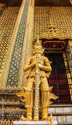 Giant guardian statue in front of thai temple