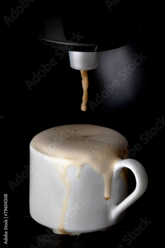 Coffee machine pouring coffee