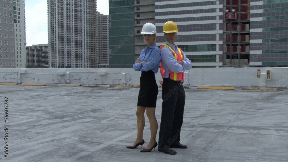 Portrait of a male and female on a construction site Portrait of a male and female on a construction site