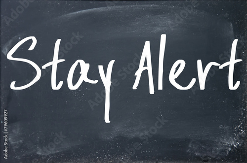 stay alert text write on blackboard