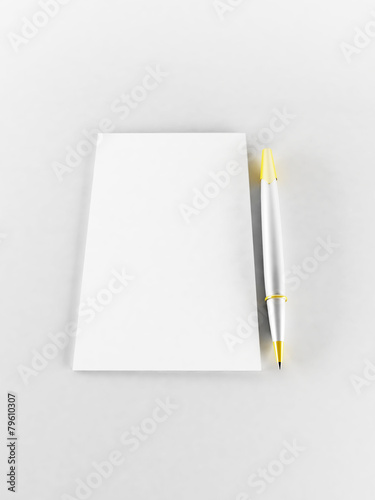 a pen and a paper on the white