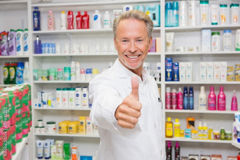 Positive pharmacist with thumb up Positive pharmacist with thumb up