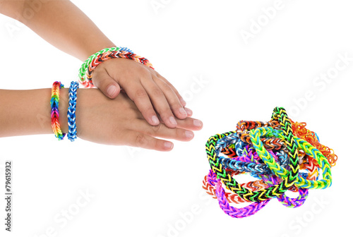 Loom rubber bracelets on a young child's hands