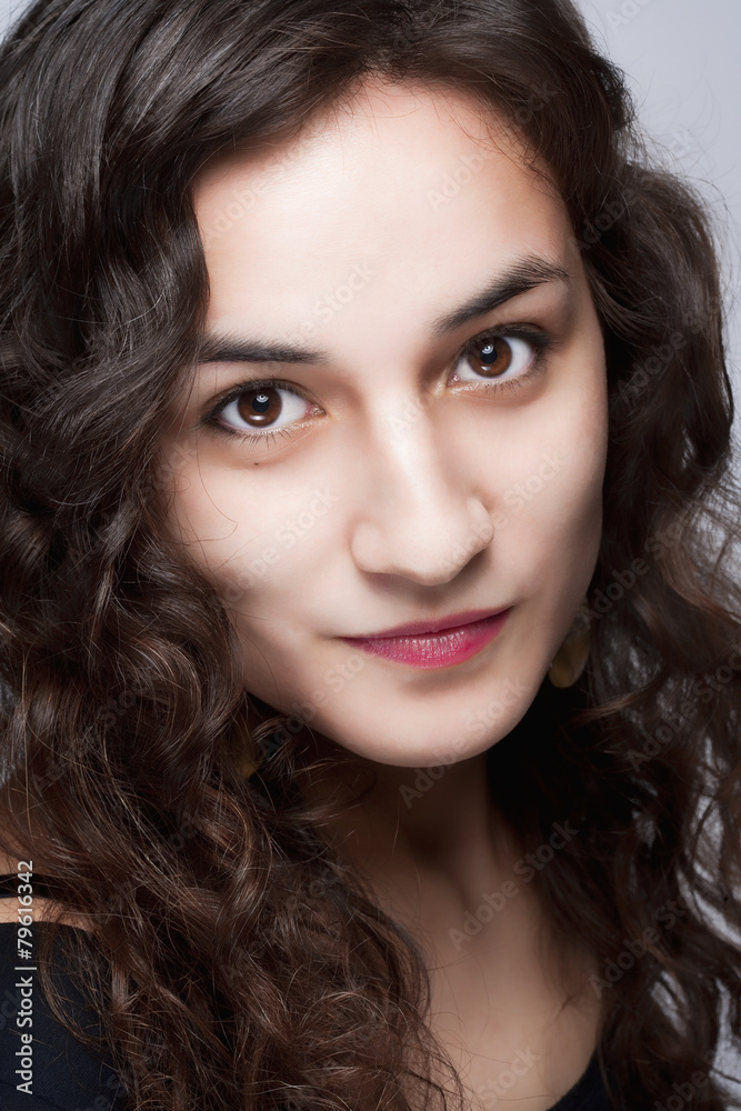 Portrait of a Young Beautiful Woman with Long Brown Hair Portrait of a Young Beautiful Woman with Long Brown Hair