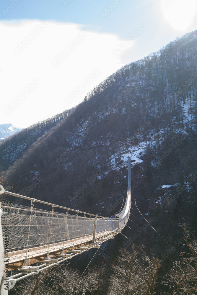 Mountain landscape with suspension bridge