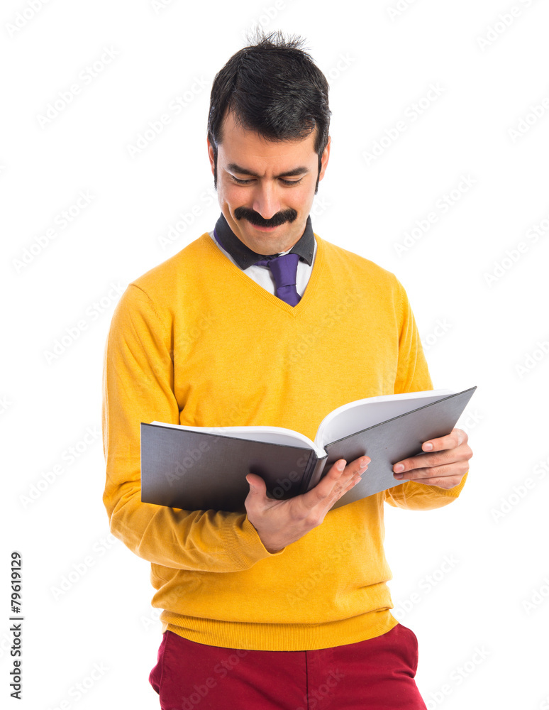 Man with moustache reading book Man with moustache reading book