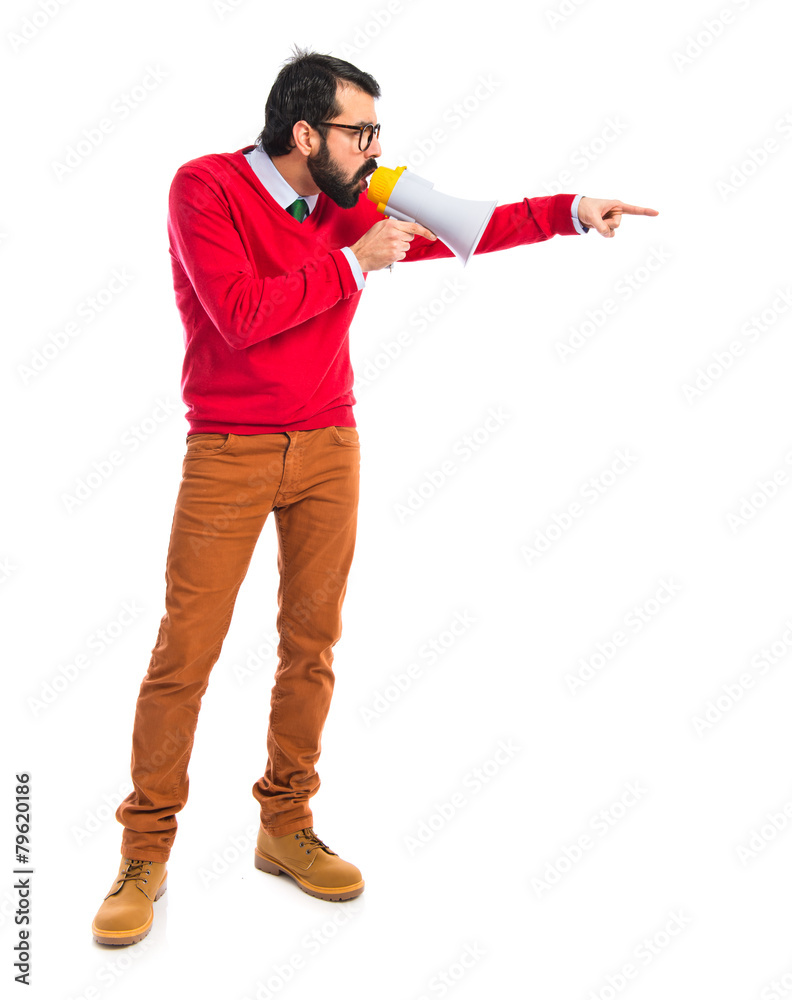 Hipster man shouting by megaphone Hipster man shouting by megaphone