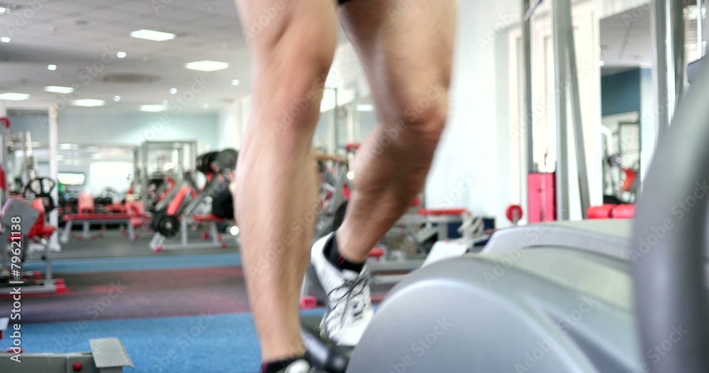 strong male sports leg on a simulator orbitrek strong male sports leg on a simulator orbitrek