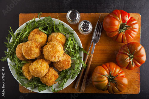 arancini with cheese & tomatoes photo