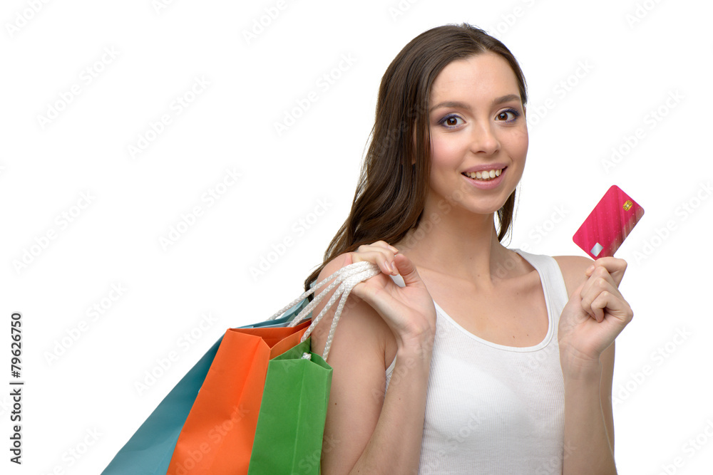 Caucasian young woman after shopping with bags and card Caucasian young woman after shopping with bags and card