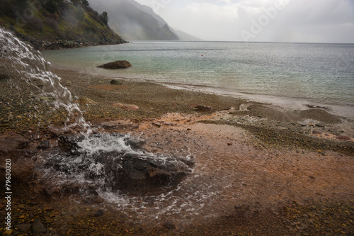 Thermal springs on the beach in Kato Illia, Evia, Greece photo