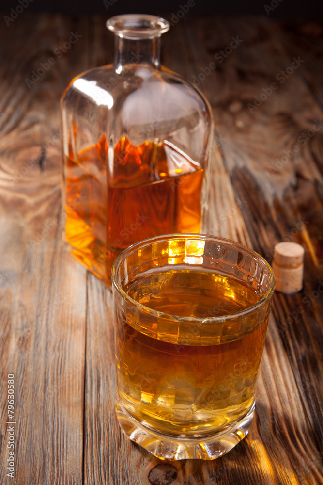 Bottle of whiskey and a glass Bottle of whiskey and a glass