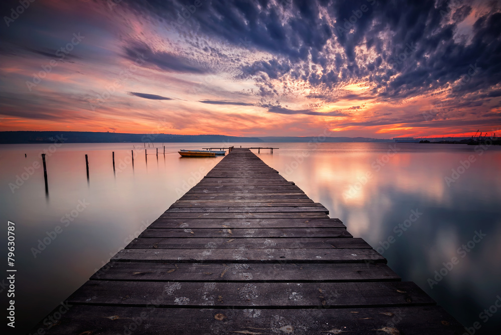 Magnificent lake sunset with boats and a wooden pier - obrazy, fototapety, plakaty 