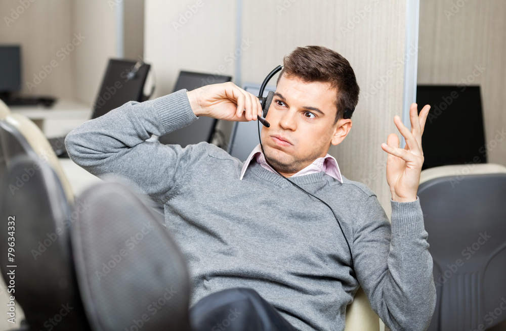 Obraz premium Angry Customer Service Representative Gesturing While Using Head