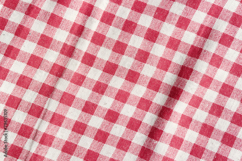 Red and white fabric texture, checkered tablecloth background.