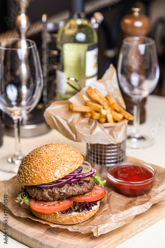 Restourant serving dish - burger with cutlet with frying potato