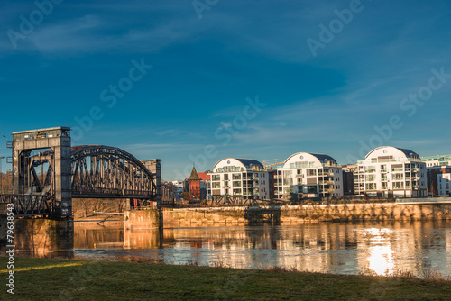 Early morning at new buildings and an old bridge in Magdeburg, G