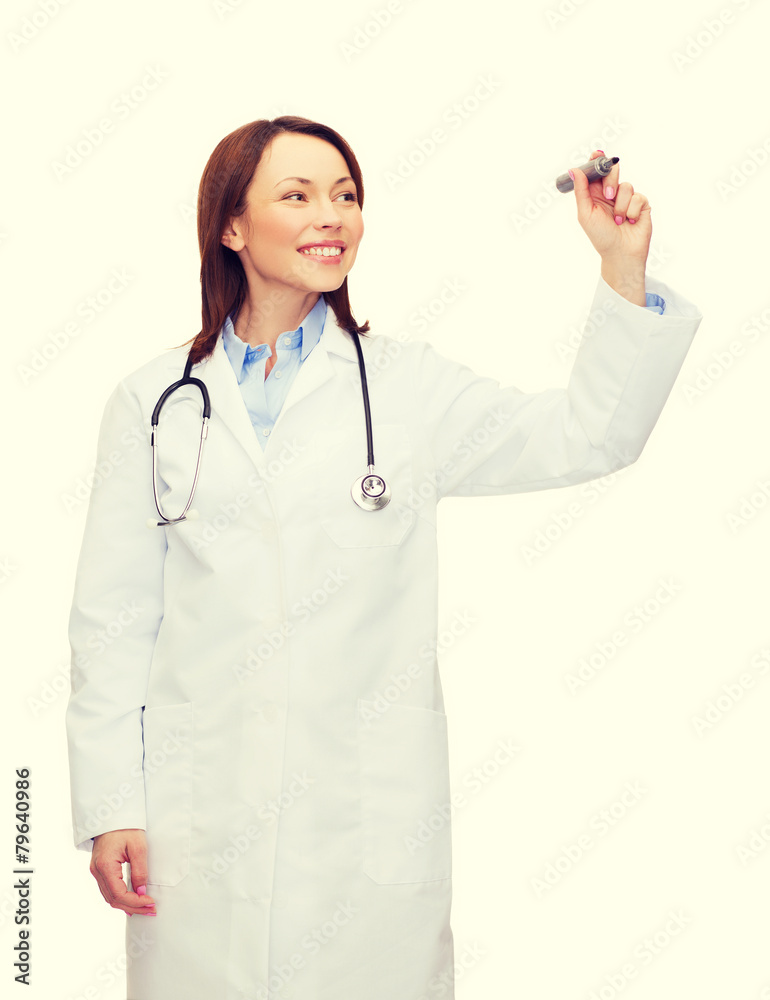 young female doctor writing something in the air young female doctor writing something in the air