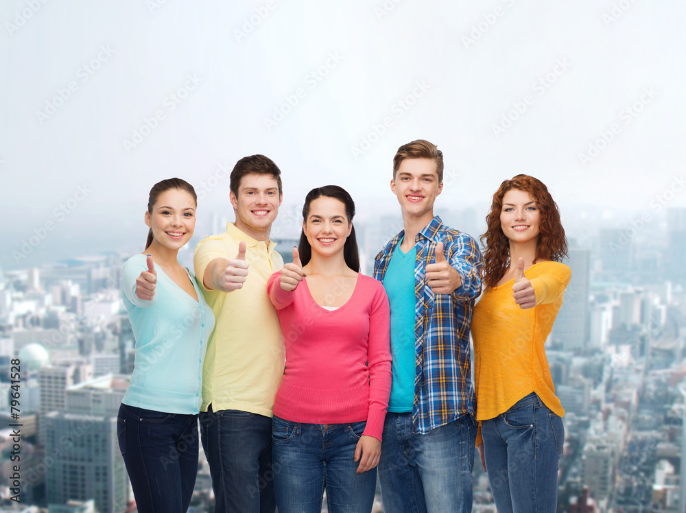 group of smiling teenagers over city background group of smiling teenagers over city background
