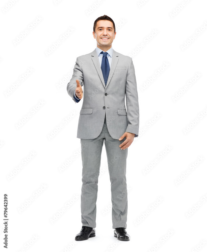 happy smiling businessman in suit shaking hand happy smiling businessman in suit shaking hand