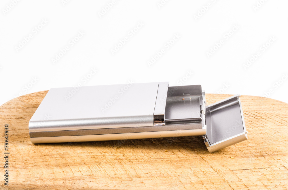 case of cigarette on wooden background
