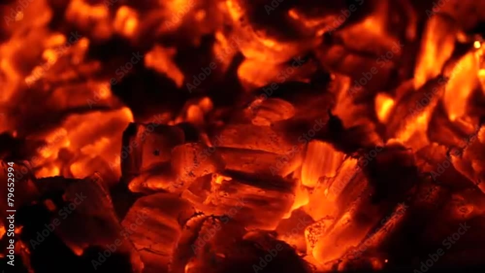 Flames and fiery coals filmed at 120fps. Flames and fiery coals filmed at 120fps.