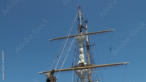 Two-masted sailing ship anchored in Papeete harbor