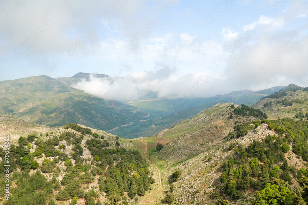 Green mountains and white clouds on the island of Crete, Greece