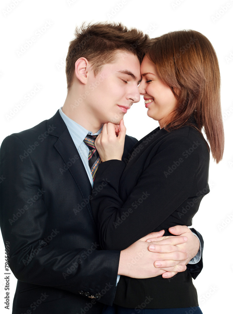 Passionate business couple embracing each other, isolate Passionate business couple embracing each other, isolate