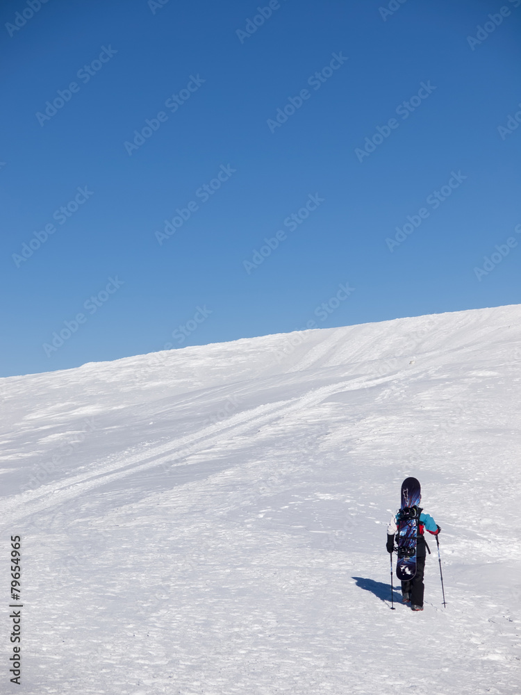 Snowboarder in the mountains.