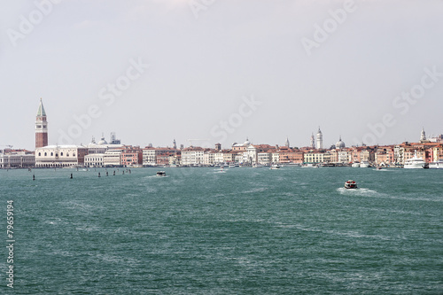 Doges palace, quays and water traffic in summer Venice