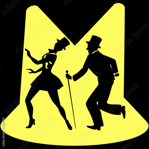 Tap dancing performers on stage under spotlights