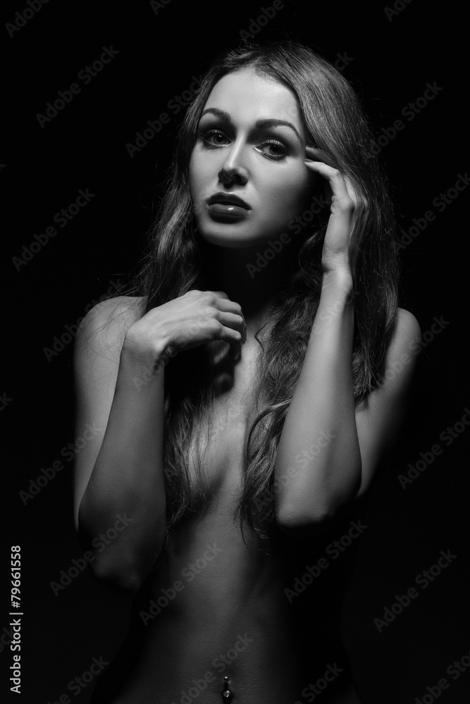 topless woman in dark topless woman in dark