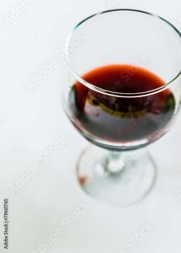 Closeup on a glass of wine.