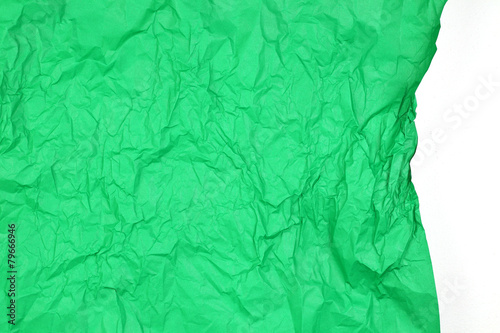 Crumpled green paper with white space