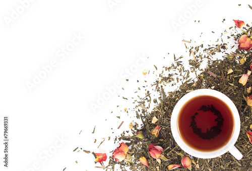 cup of flower tea on dry background. View from above.