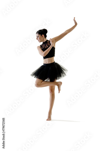 Young attractive ballerina doing alternate dance moves